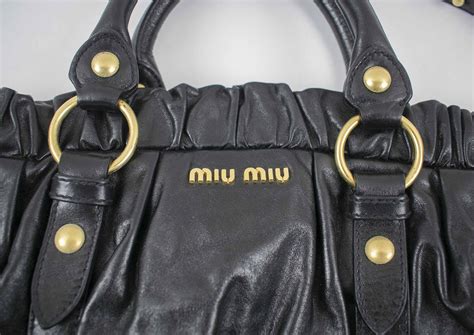 miu miu tote second hand|real real miu bags sale.